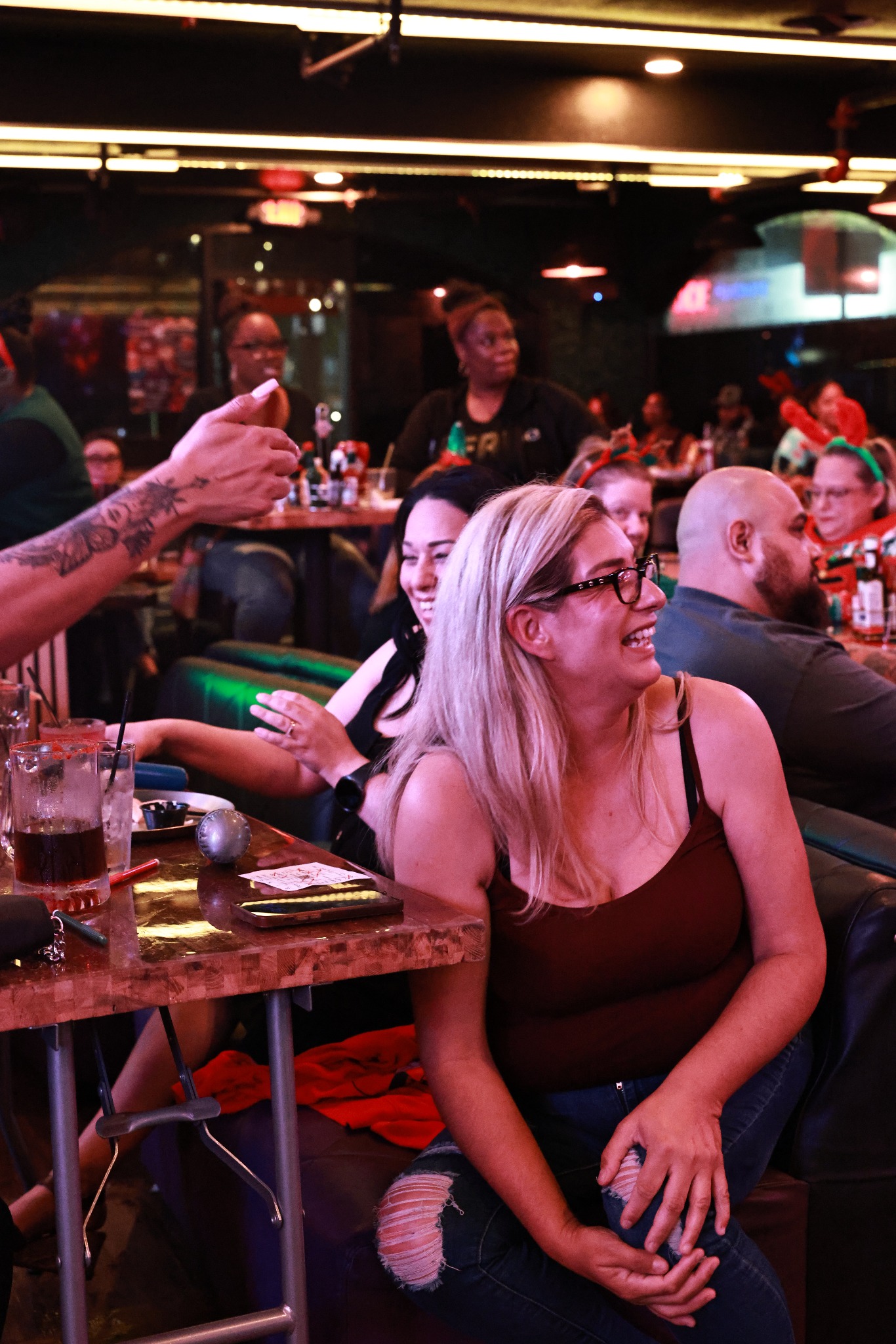 Rhythm & Bingo guests laughing together during the event
