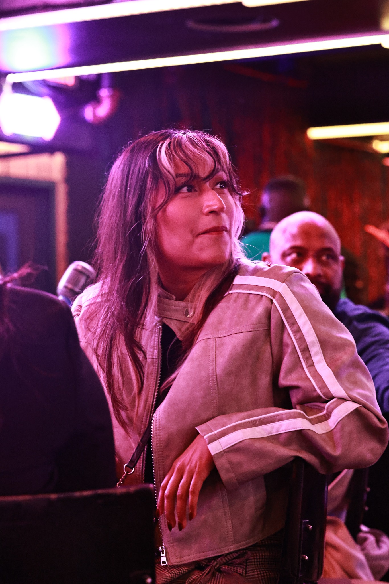 Guest reacting to the music at Rhythm & Bingo
